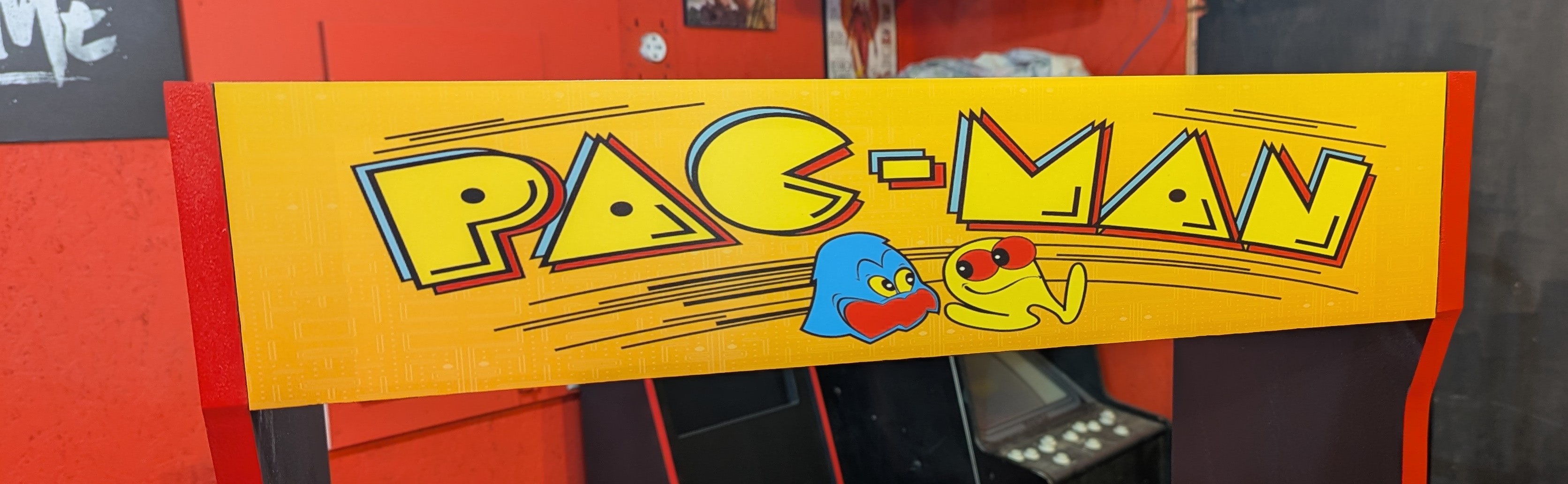 Pac-Man marquee mounted on the Pac-Man Classic arcade cabinet